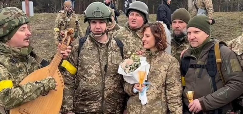 Leaving White Dress And Tuxedo Behind, Ukrainian Couple Gets Married In Military Uniforms