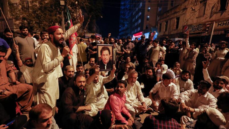 Imran Khan greets supporters outside home after Pakistan police arrest operation ends in chaos